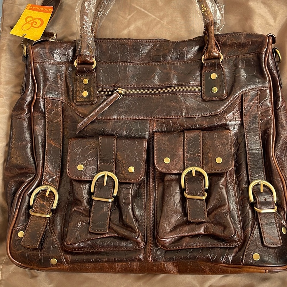 Woman shoulders bag . Laptop. Beautiful design. Jubilee newyork .